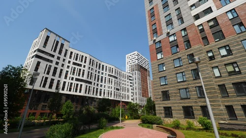 in a beautiful courtyard of a new multi-storey residential building