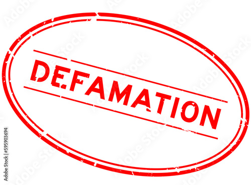 Grunge red defamation word oval rubber seal stamp on white background