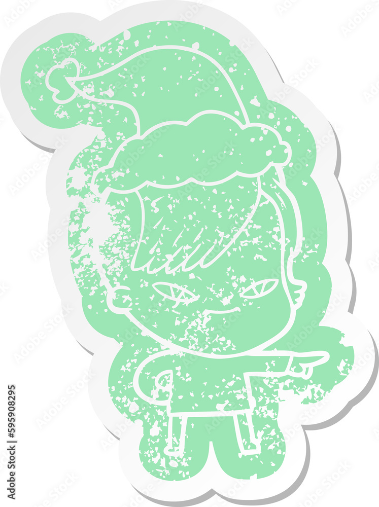 cute quirky cartoon distressed sticker of a girl with hipster haircut wearing santa hat