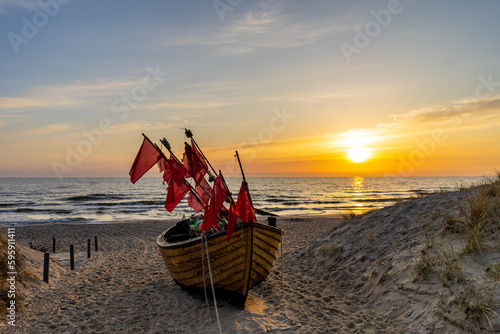Fototapeta Naklejka Na Ścianę i Meble -  fishing boat on the baltic sea beach