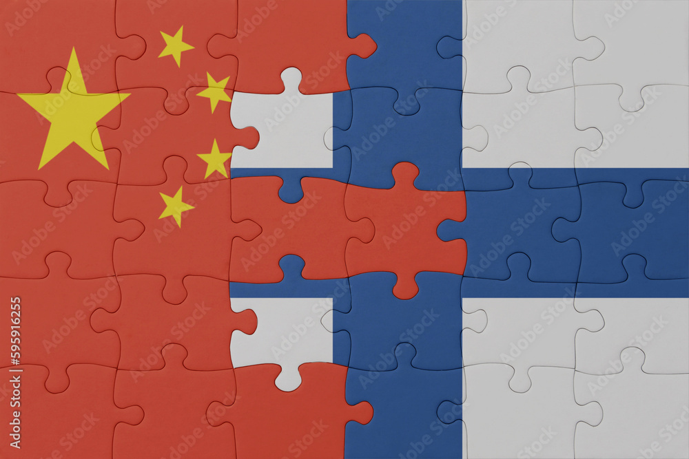 puzzle with the national flag of finland and china . macro.concept. puzzle with the national flag of finland and china . macro.concept.