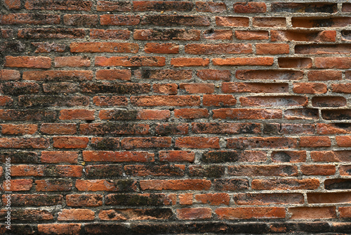 Damaged and old brick wall texture.
