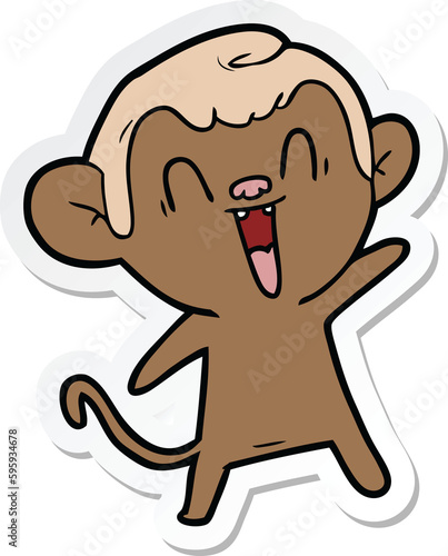 sticker of a cartoon laughing monkey