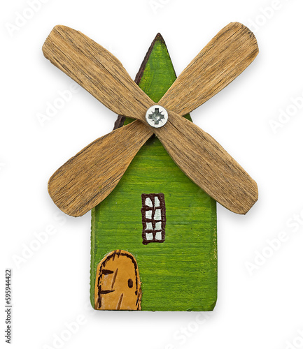 Green toy windmill .wooden house with green wind energy. Eco energy .insulation