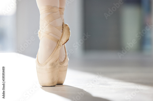 Ballet technique is arbitrary and very difficult. a group of unrecognizable ballet dancers during their rehearsal in a studio.