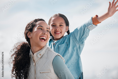 I love seeing her enjoy herself. a little girl and mother spending time together on a ranch.