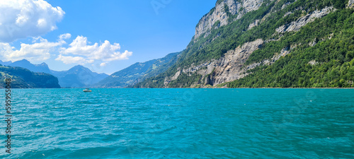 Panoramic view of the lake and mountains on the background.