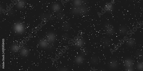 Many snowflakes in blur on black background. Snowfall layer for winter photography.