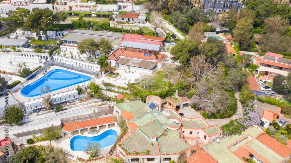 Fototapeta premium Aerial view of Posillipo district in the city of Naples, Campania, Italy. The area is full of hotels, bed and breakfast and luxury villas.