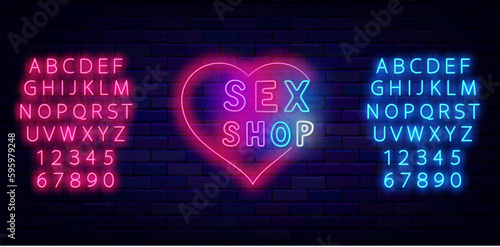 Sex shop neon label on brick wall. Colorful handwritten text. Shiny blue and pink alphabet. Vector stock illustration