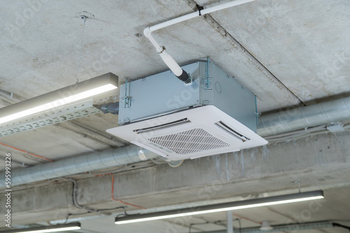 Industrial air conditioner in the office on a concrete ceiling. 