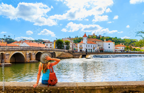 Photos Woman tourist visiting city of Tomar in Portugal, Santarem