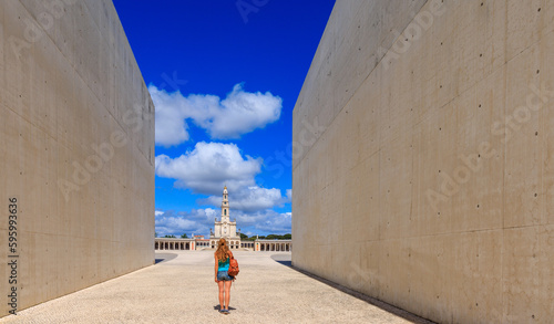 Fatima, famous city in Portugal-Woman traveler looking at baslica