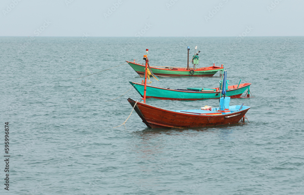 Group of fishing boat floating on the sea.