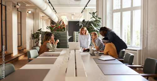 Diverse businesspeople discussing work