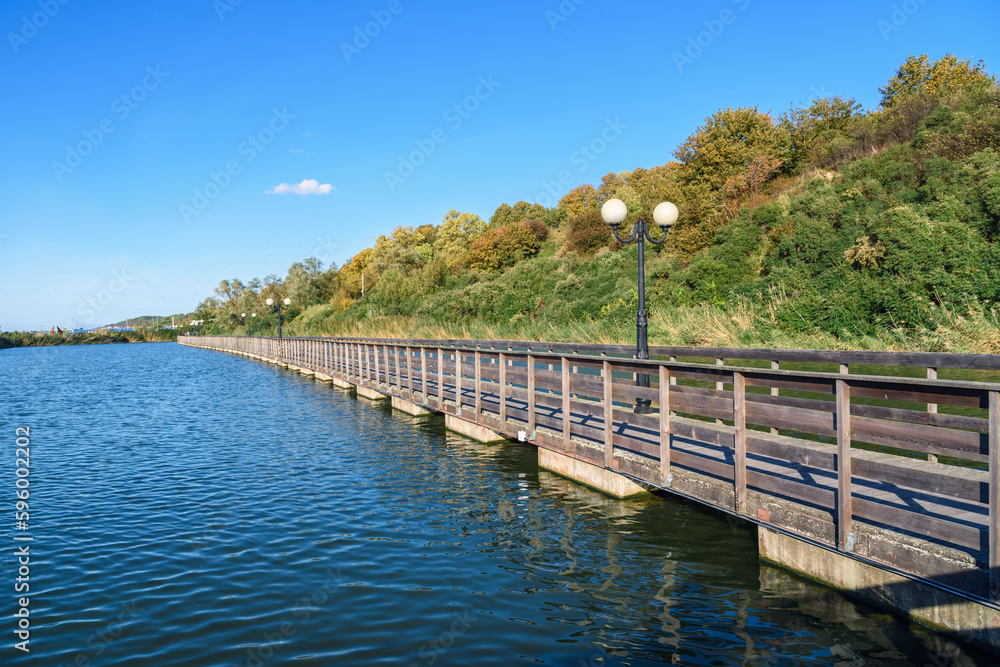 Wooden promenade along the Baltic Sea coas. Yantarny. Kaliningrad region. Russia