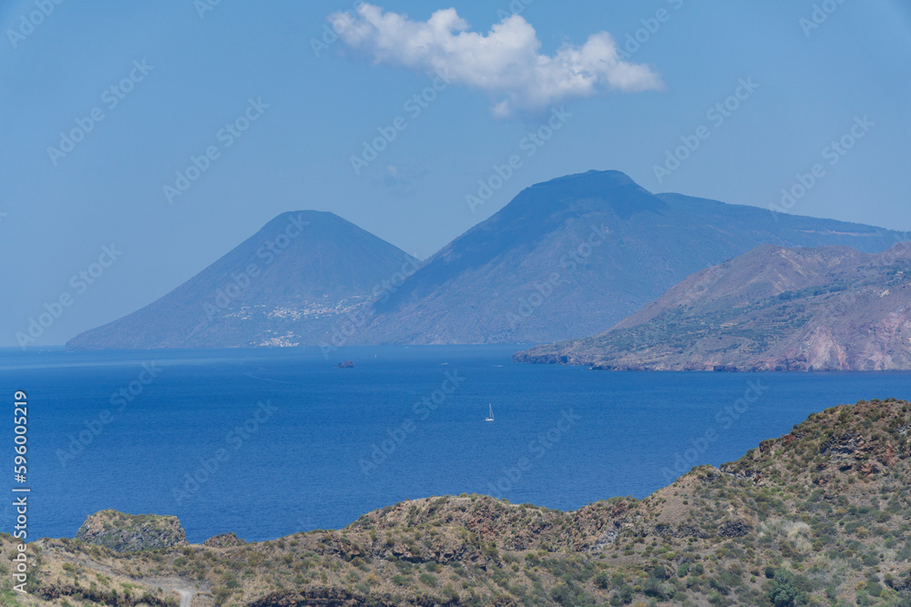 Fototapeta premium Eolias island landscape viewed from vulcano island with town and mediterranean sea
