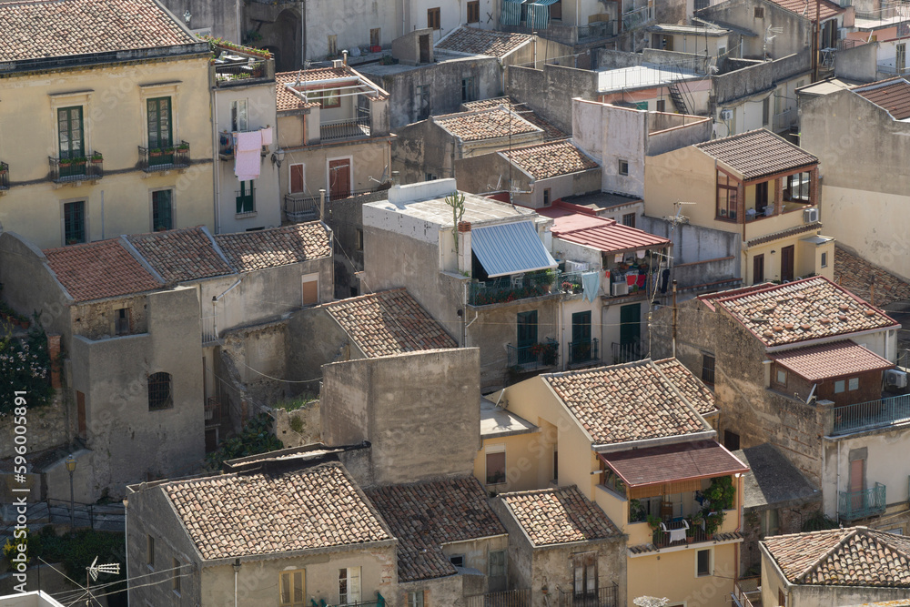 Beautiful aerial shot of tipically milazzo city houses located into sicily italian island on sunny day
