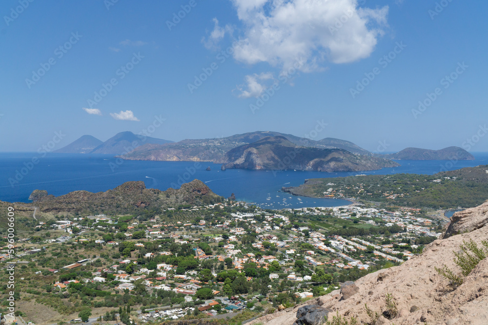 Vulcano island town and sicily island landscape viewed from vulcano in sunny day
