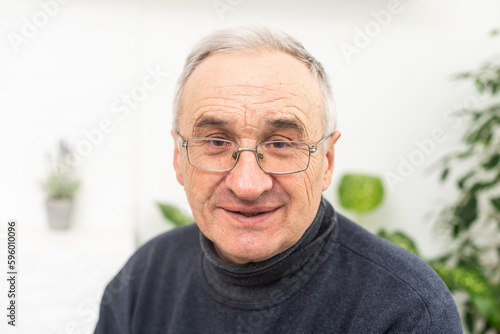 Smiling senior man with eyeglasses