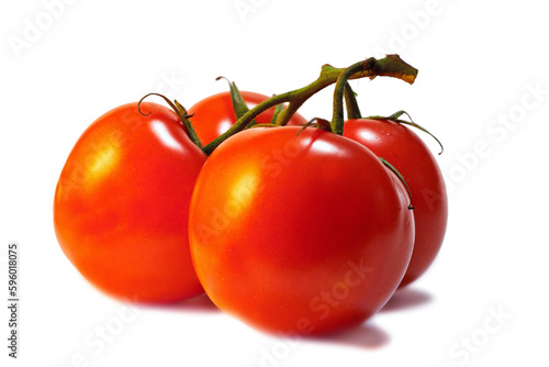 One whole bright red fresh tomato, vegetable isolated inside of a bright studio against a white background. Fresh from the farm. A healthy and nutritious snack to add to your vegan or vegetarian diet