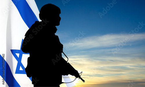 Silhouette of soldiers with Israel flag against the sunrise. Concept - armed forces of Israel. EPS10 vector