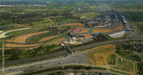 An aerial view of the race track hosting the 24 Hour Endurance Car Race at Le Mans. The famous winding track in Europe. Car racing in France photo