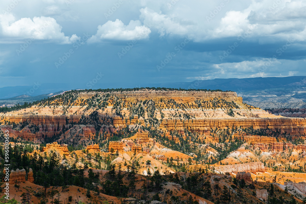 Bryce Canyon and table mountain with storm clouds, Bryce Canyon national park, Utah, USA.
