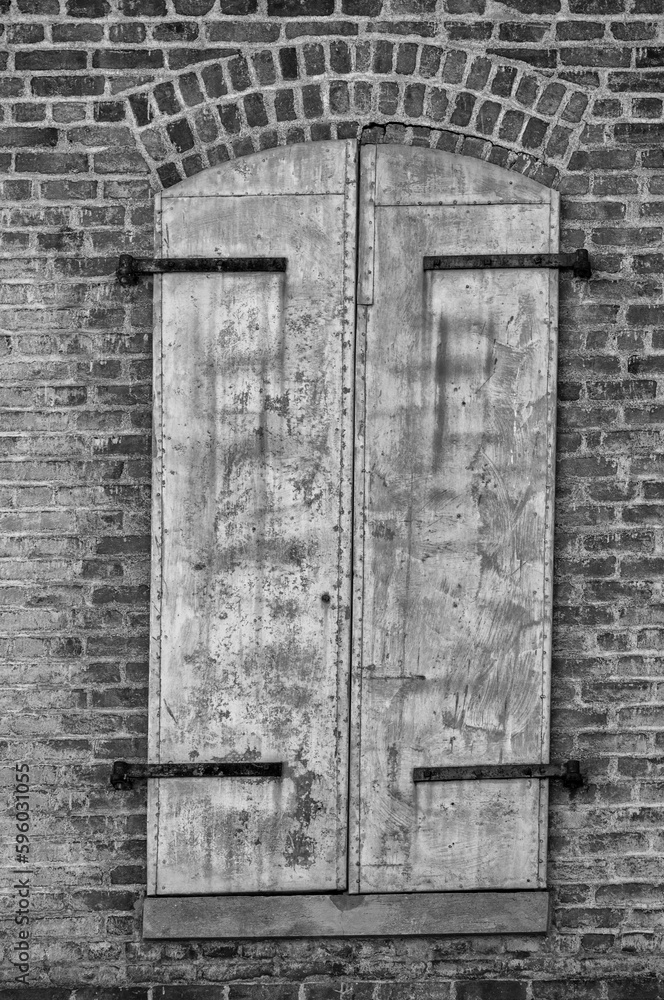 Vintage Brick Building with Steel Double Doors.