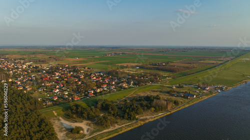 Mikoszewo. Drone view of the city and the Vistula River on a sunny afternoon in early spring.