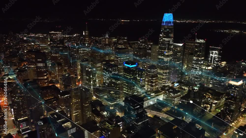 Aerial panoramic view of illuminated downtown skyscrapers at night. Moving lines as charts, economy and business visual effects. San Francisco, USA Aerial panoramic view of illuminated downtown skyscrapers at night. Moving lines as charts, economy and business visual effects. San Francisco, USA