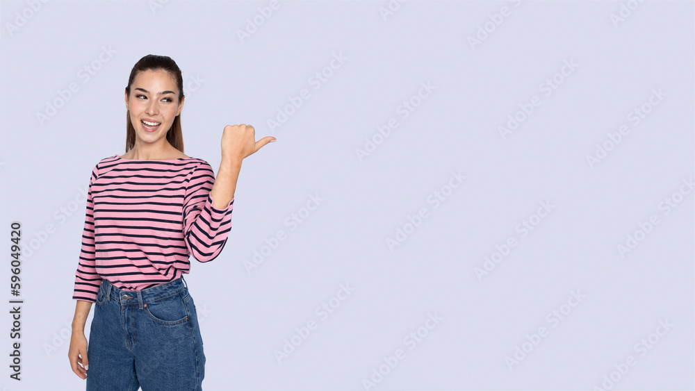Emotional attractive young hispanic woman pointing at copy space Emotional attractive young hispanic woman pointing at copy space