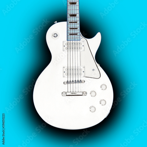White guitar isolated on blue background