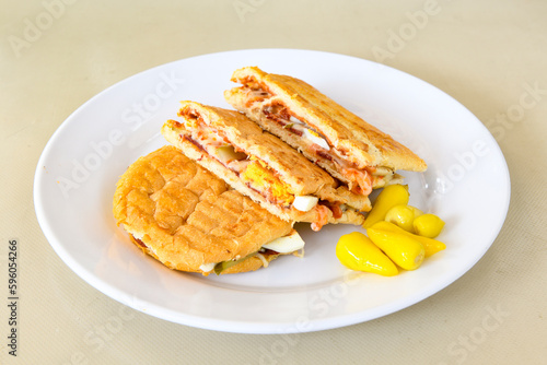 Turkish karisik atom Ayvalik tost ( kasarli bazlama tost) . Sucuklu, Kasarli, kavurmali karisik tost. Flat baked bread toasted