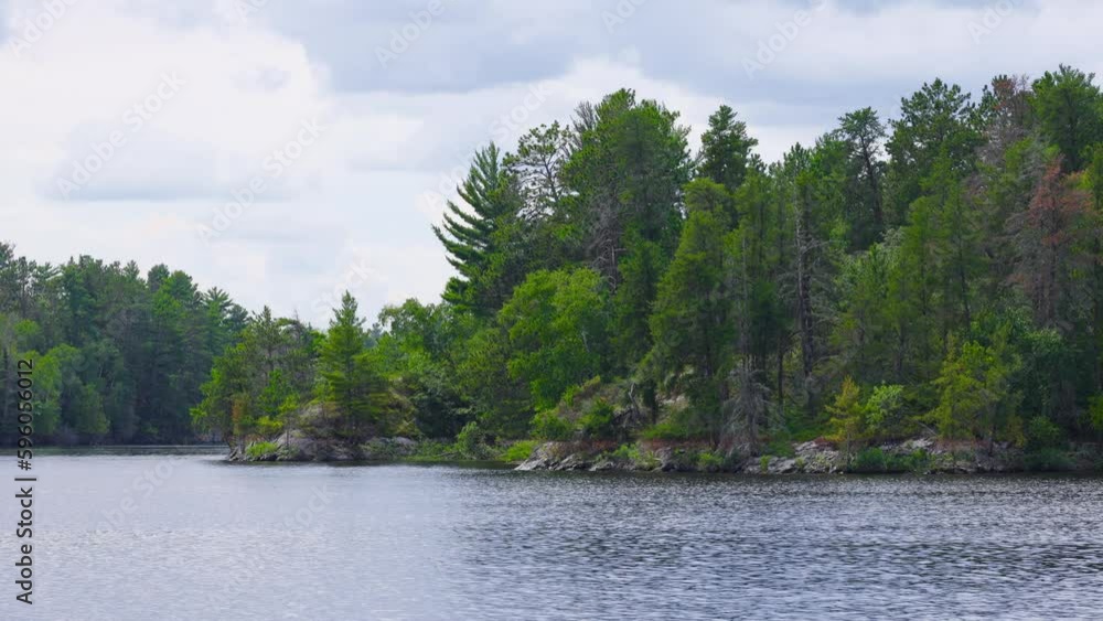 The beautiful Rainy Lake and forests of Voyageurs National Park in northern Minnesota along the border of Canada. The beautiful Rainy Lake and forests of Voyageurs National Park in northern Minnesota along the border of Canada.