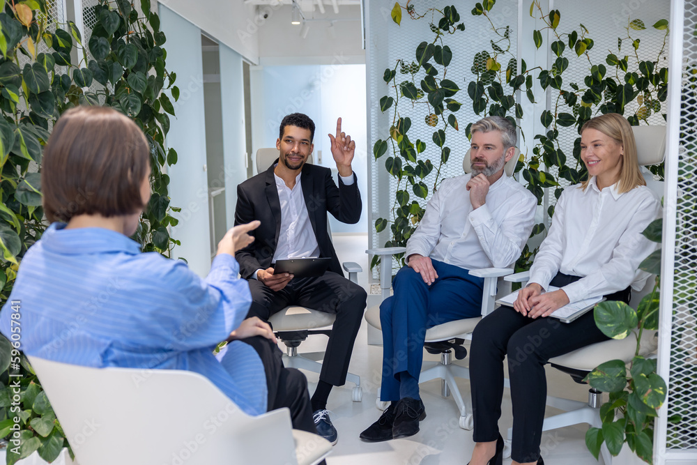 Group of people having a psychotherapy session Group of people having a psychotherapy session