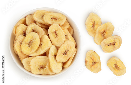 Dried banana chips in ceramic bowl isolated on white background with full depth of field. Top view. Flat lay