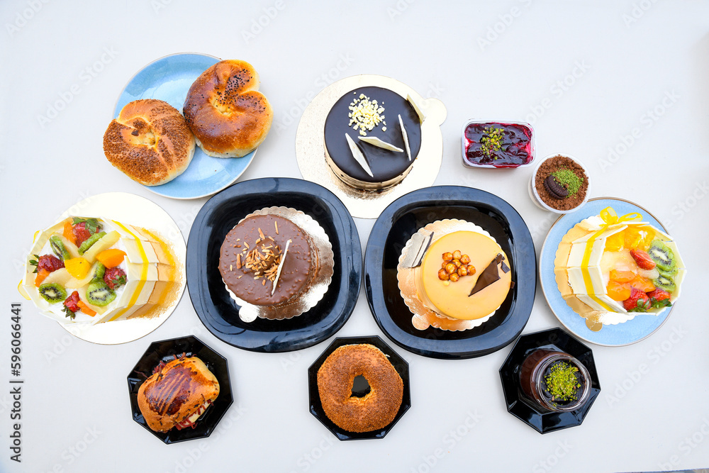 Table scene of assorted take out or delivery foods. Traditional Turkish cuisine. Various Turkish meal and appetizers. Top down view on a table. Table scene of assorted take out or delivery foods. Traditional Turkish cuisine. Various Turkish meal and appetizers. Top down view on a table.