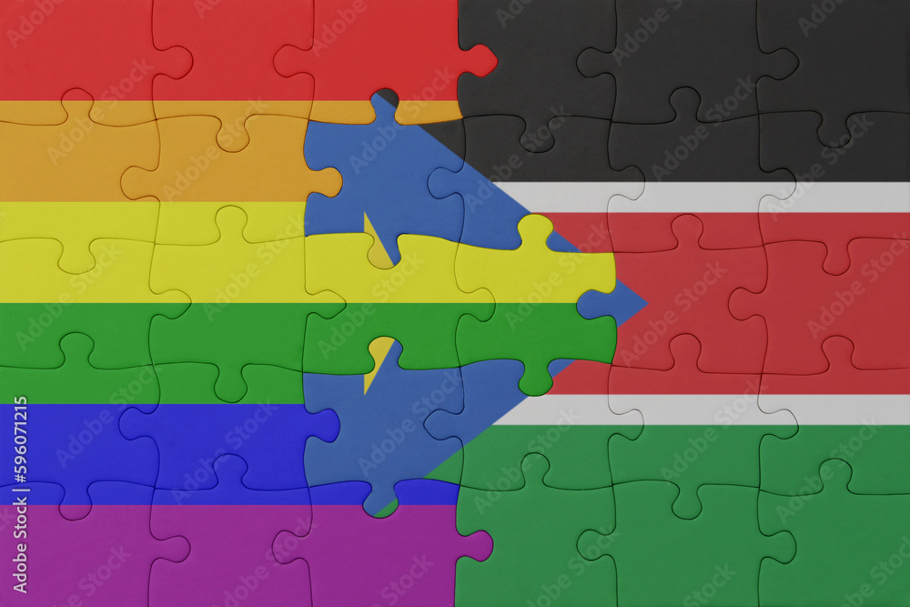 puzzle with the flag of rainbow gay pride and south sudan . macro.concept. puzzle with the flag of rainbow gay pride and south sudan . macro.concept.