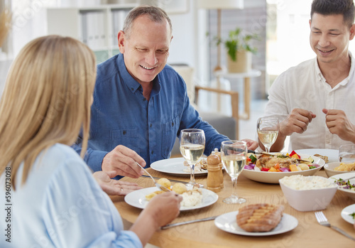 Youve outdone yourself. a family having lunch together at home.