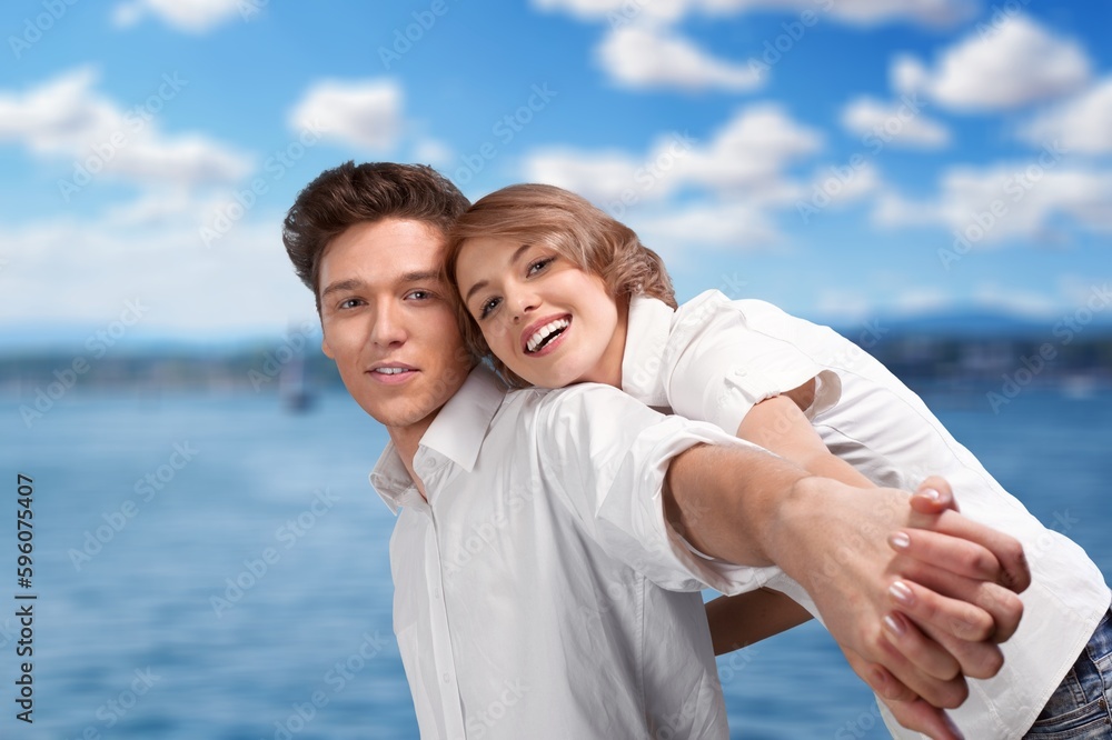 Happy beautiful couple on beach. have fun Happy beautiful couple on beach. have fun