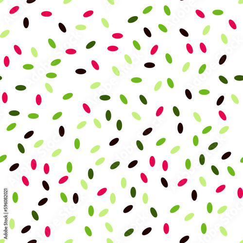Multicolored seamless pattern with oval spots on a white background. Decorative pattern in abstract style with watermelon seeds. Design for textile, fabric, wallpaper. Multicolored oval dots.
