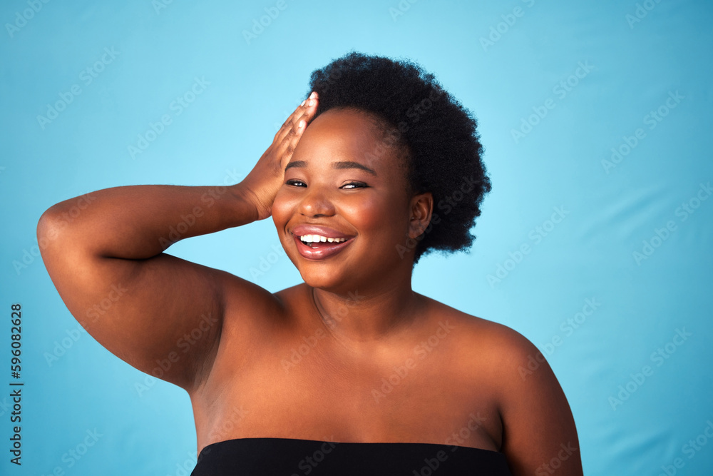 Its who I am. Studio shot of a beautiful woman feeling confident with her natural hair. Its who I am. Studio shot of a beautiful woman feeling confident with her natural hair.