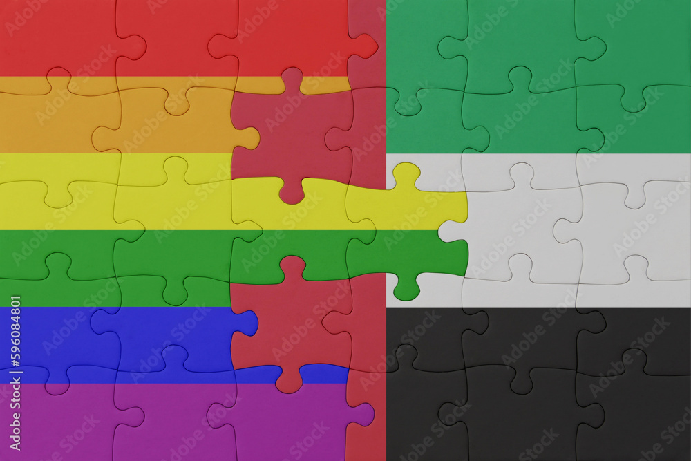 puzzle with the flag of rainbow gay pride and united arab emirates . macro.concept. puzzle with the flag of rainbow gay pride and united arab emirates . macro.concept.