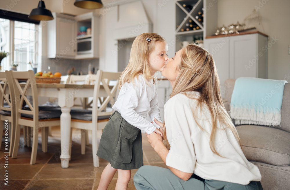 Together is my favorite place to be. a mother and daughter giving each other a kiss at home. Together is my favorite place to be. a mother and daughter giving each other a kiss at home.