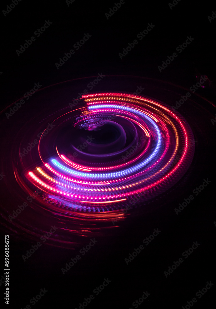 Naklejka premium Music Dj concept. Trail of fire and smoke on vinyl record. Burning vinyl disk. Turntable vinyl record play Selective focus