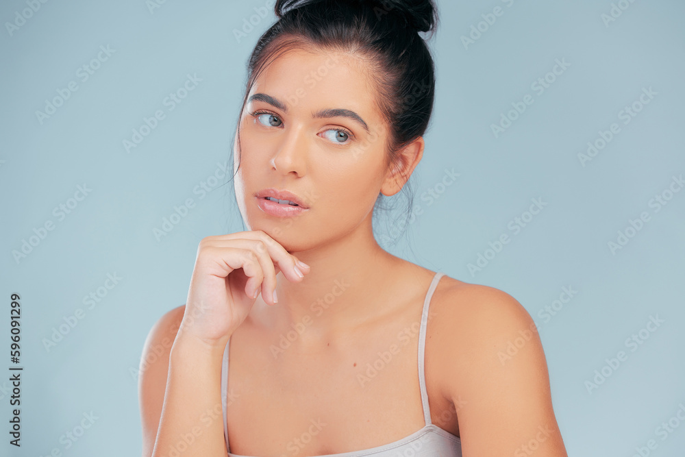 My mind is always working. an attractive young woman looking contemplative while posing alone in the studio. My mind is always working. an attractive young woman looking contemplative while posing alone in the studio.