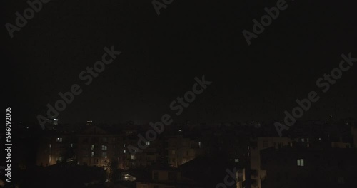 lightning rain night city weather