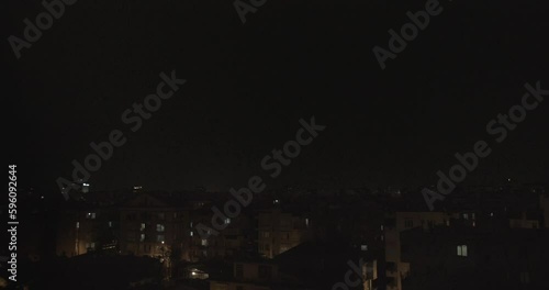lightning rain night city weather