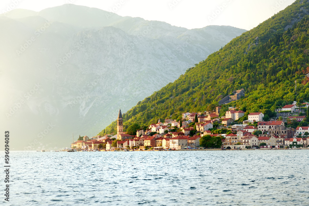Breathtaking panoramic view of the ancient city of Perast, Montenegro. Old medieval little town with red roofs. Amazing Kotor bay on the coast of Adriatic sea.
